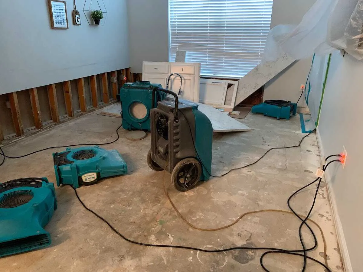 Dehumidifier in flood-cut room for Water Damage Restoration in Uhrichsville